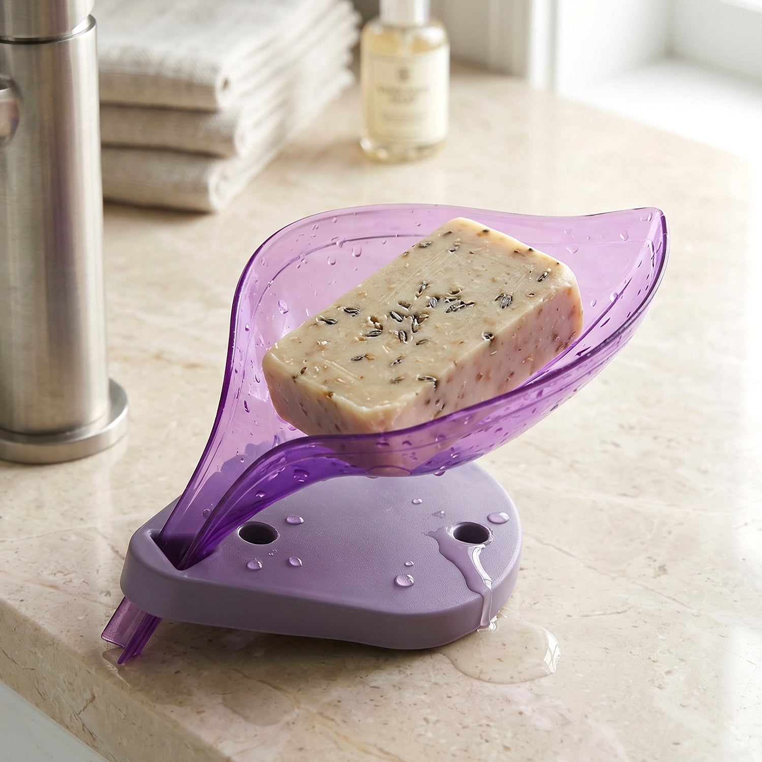 Top-down view of a leaf design soap stand with drainage slots.