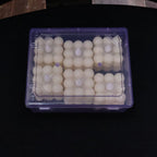 Close-up of warm glowing decorative LED candle light