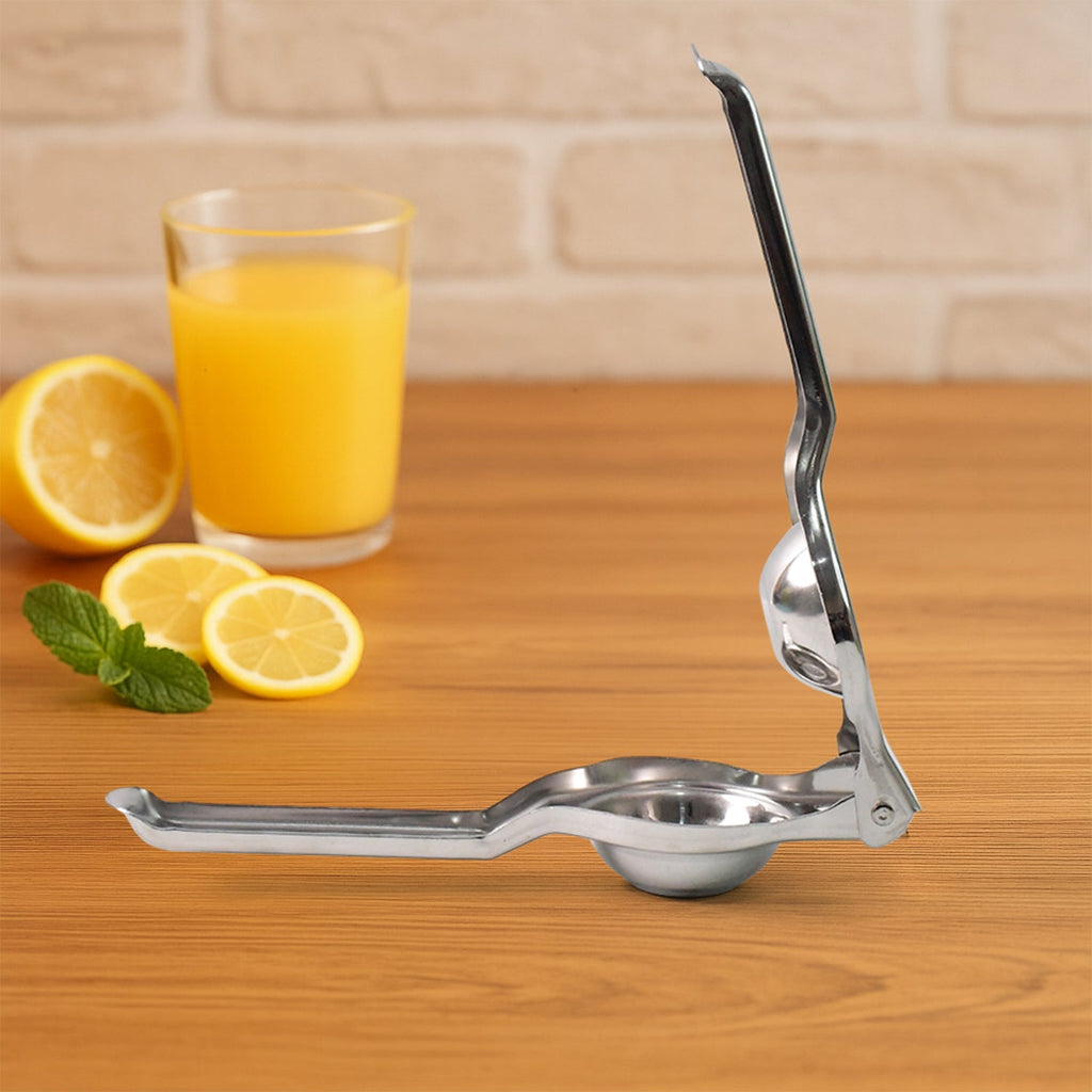 Closeup of steel lemon squeezer highlighting sturdy build and bottle opener