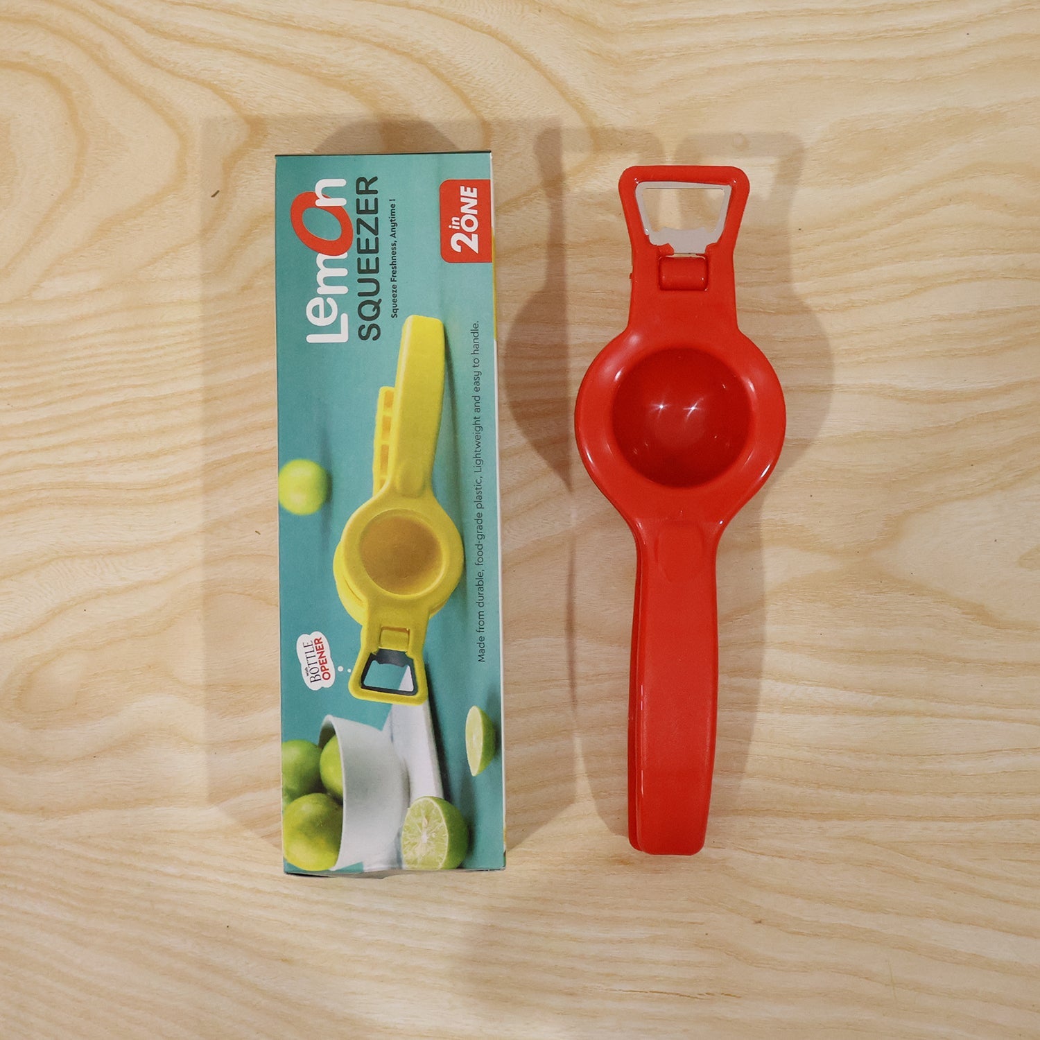 Person actively using the 2-in-1 lemon squeezer to juice a lemon.