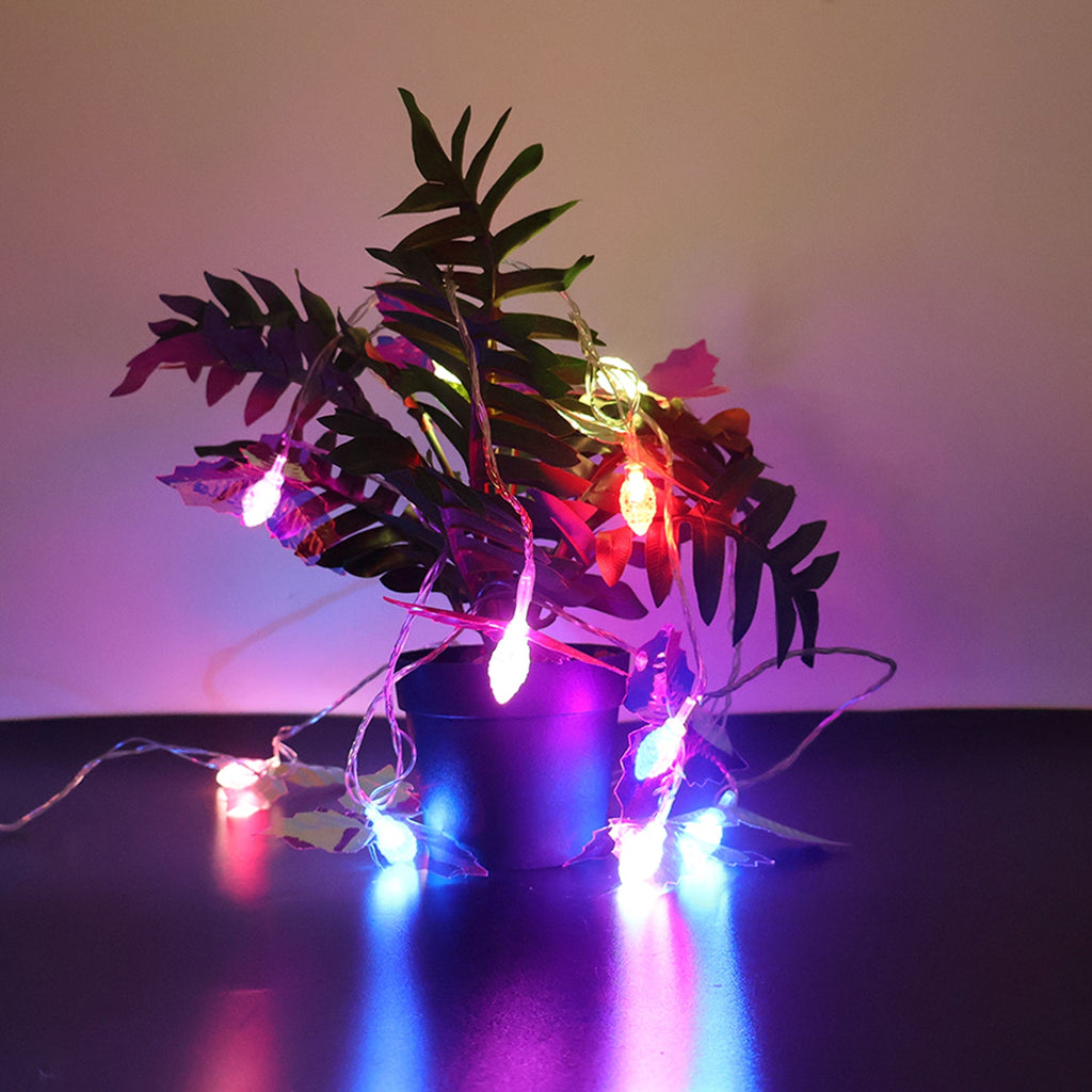 4 meter decorative LED string lights with green leaf covers illuminating room
