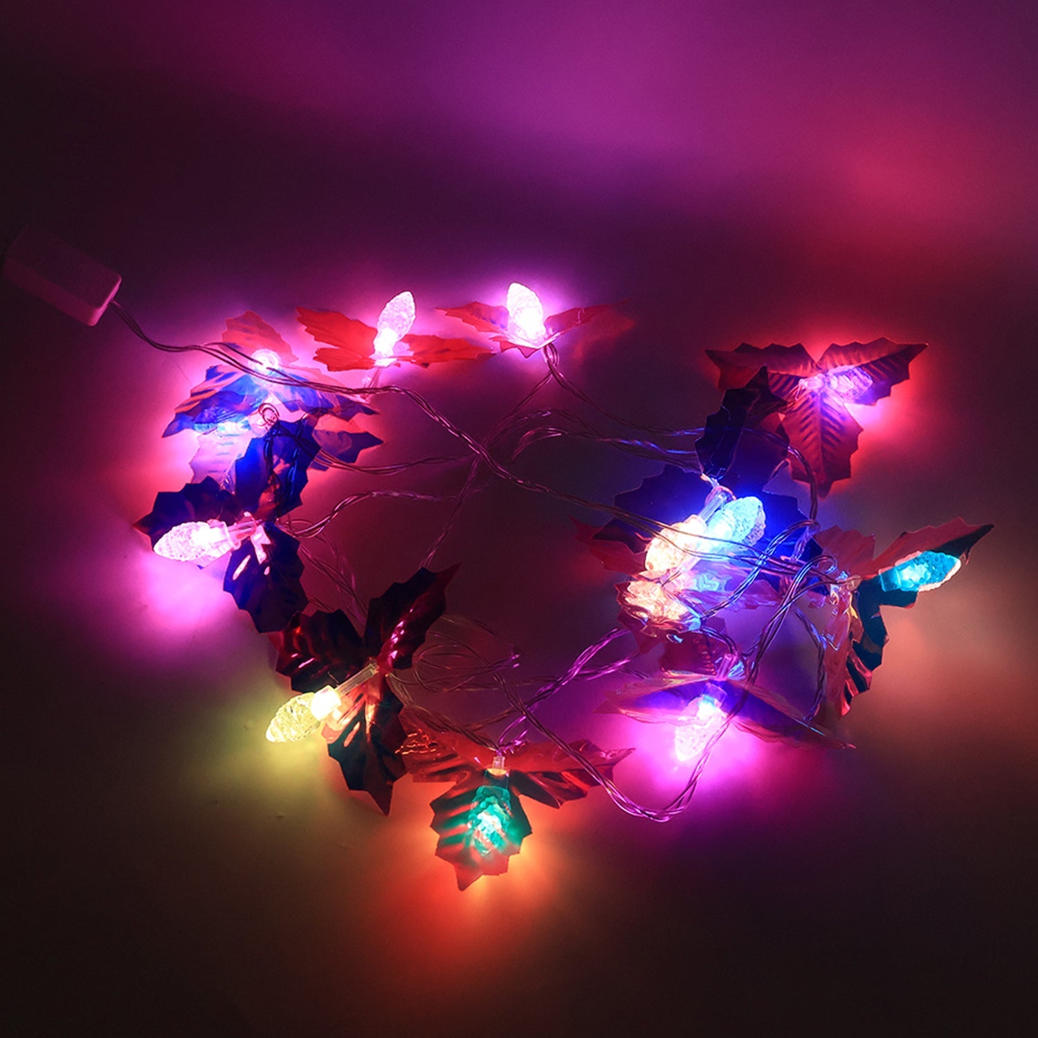 Flexible multicolor LED leaf string lights wrapped around home furniture