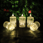 LED candle light with flame-shaped top and crystal ribbed body