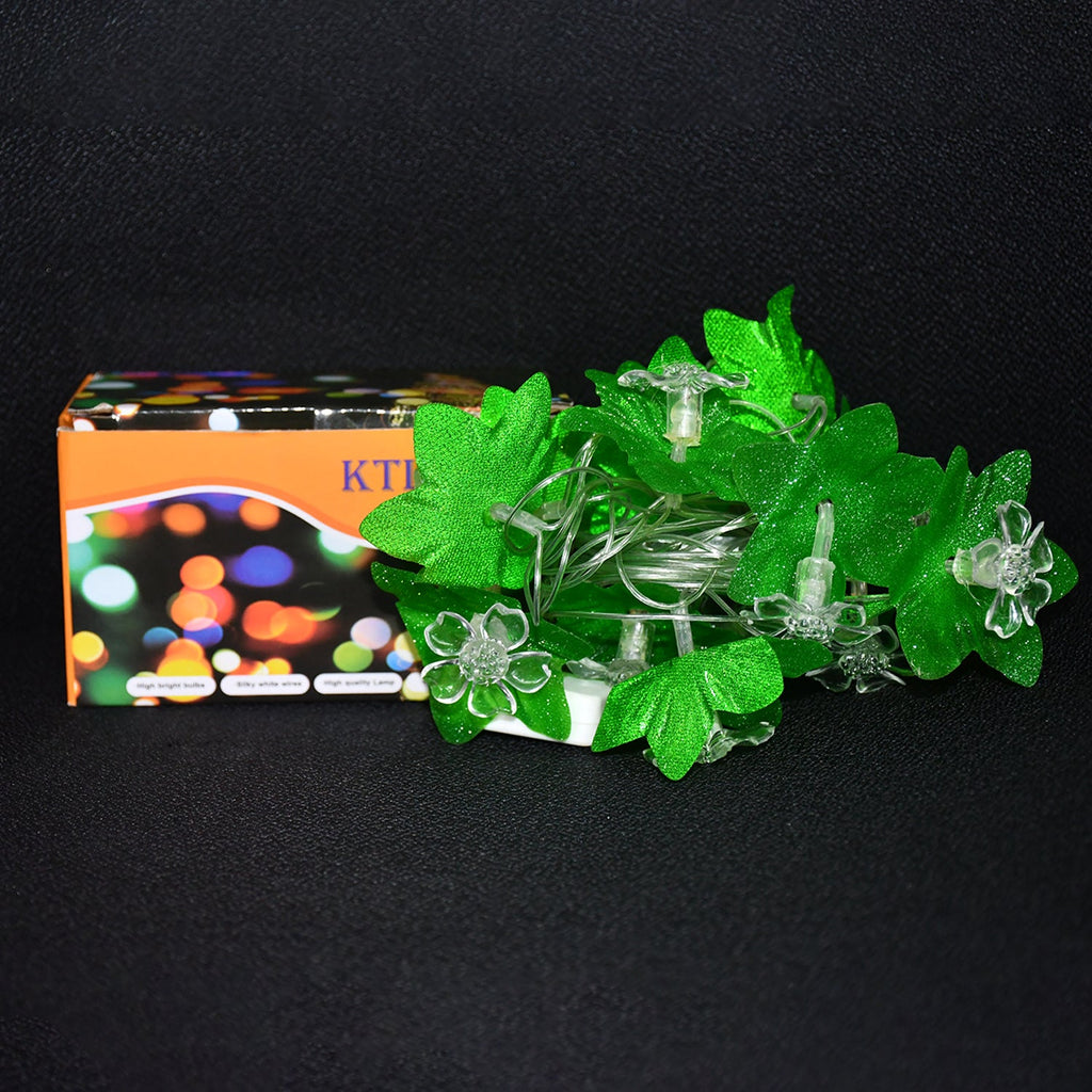 Festive multi-color Leaf & Flower LED Decorative String Light illuminating a home wall