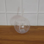 Illuminated LED drink cup with straw for festive occasions