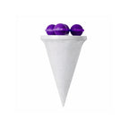 Laundry lint catcher ball positioned in washing machine