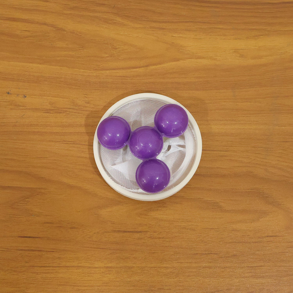 Washing machine cleaning ball for lint removal