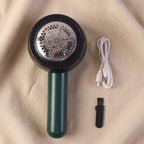 Portable lint remover in action, suited for fabric and clothes care