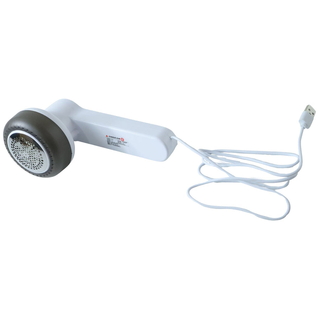 Electric lint remover device for blankets and upholstery cleaning