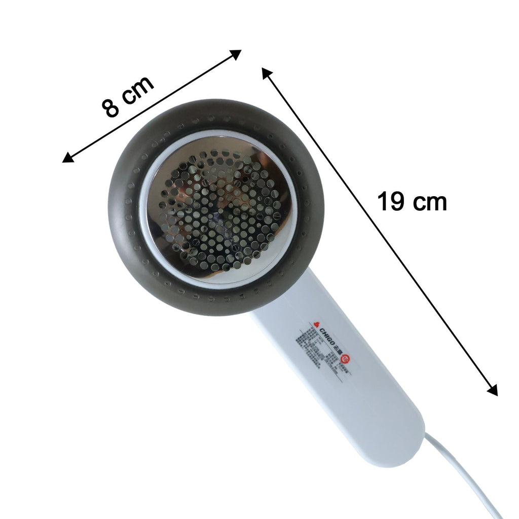 Compact rechargeable fabric lint remover showing size comparison
