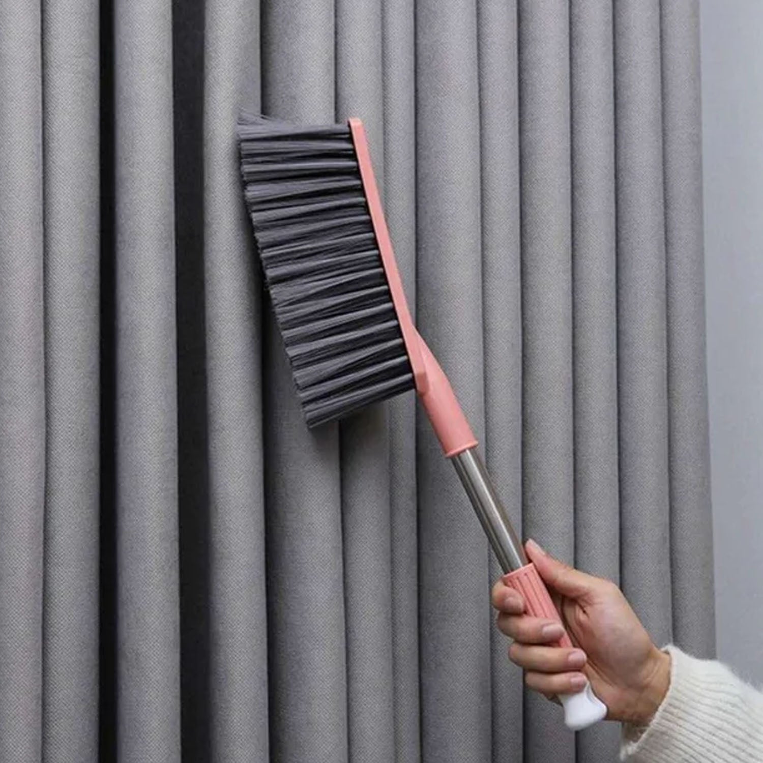 Soft bristle dusting brush with ergonomic long handle for easy cleaning