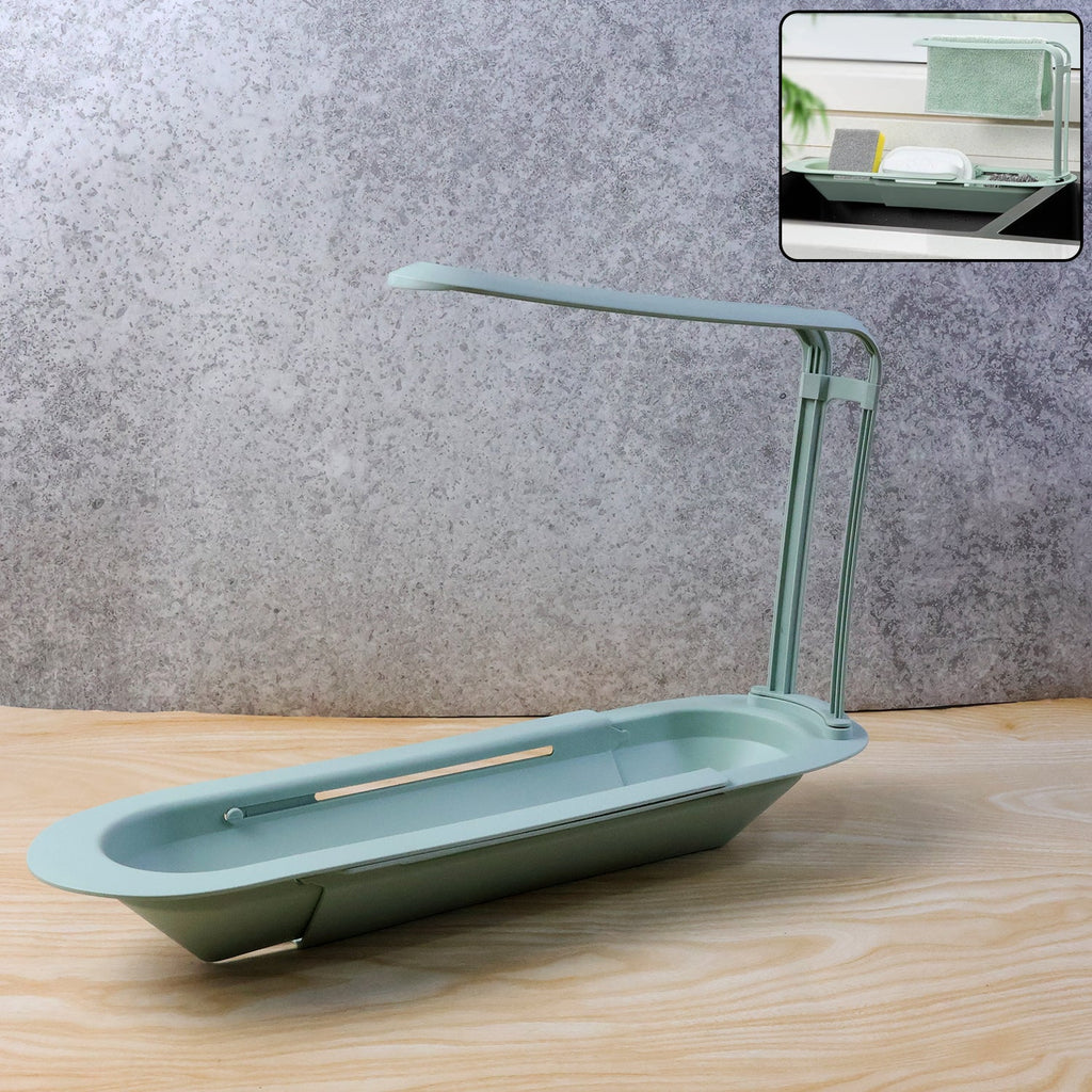 Telescopic sink storage rack holding sponges and brush
