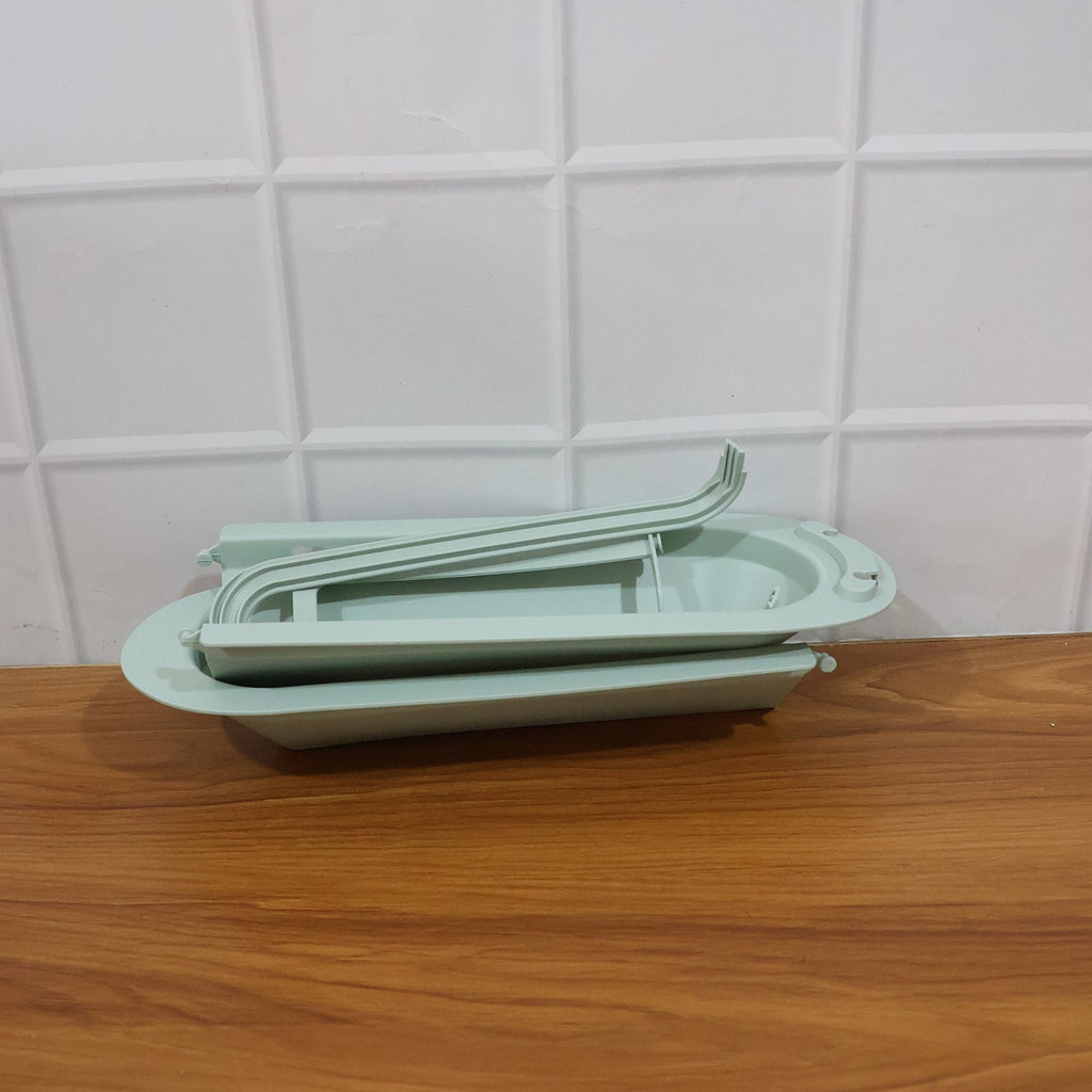 Telescopic sink storage rack installed in modern kitchen setting