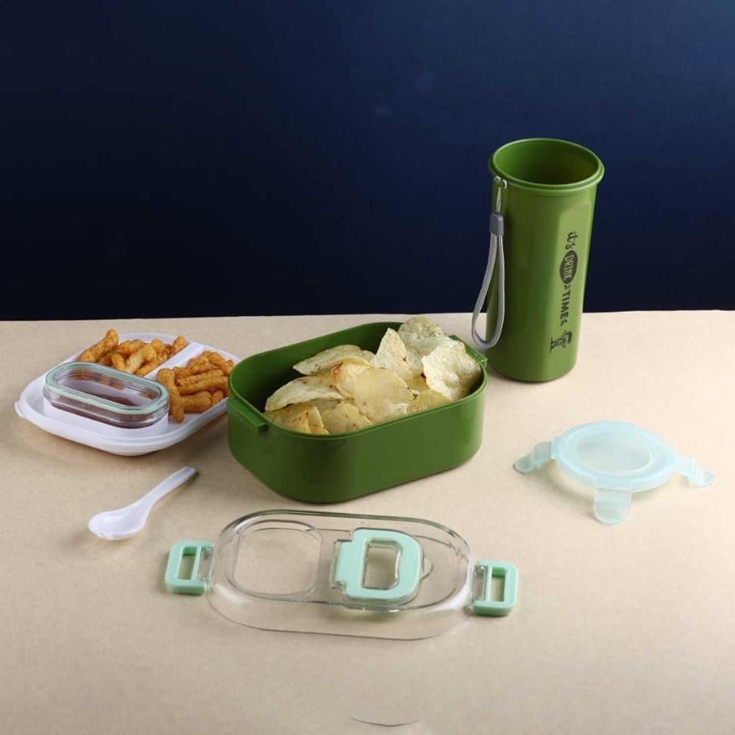 Stylish purple leakproof lunch box with a transparent lid and a matching tumbler.