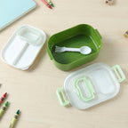 The lunch box set displayed on a table, showcasing its modern and practical design.