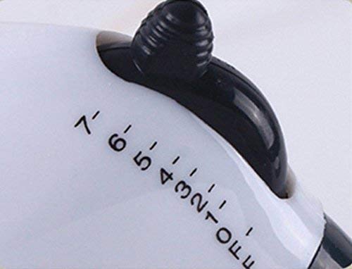 Ergonomic electric hand blender whipping cream in a bowl.