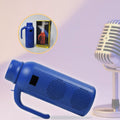 Portable Bluetooth speaker with an integrated LED torch light shown in a dark setting.