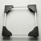 Adjustable appliance stand elevating a washing machine in a laundry area