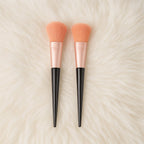 Close-up of beauty essentials soft makeup brushes with synthetic bristles