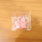 Cute couple bear keychain in lifestyle setting for gifting