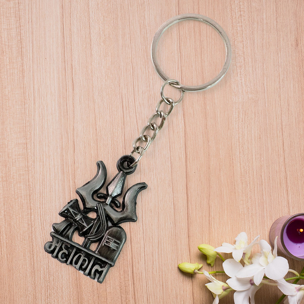 Close-up of Mahakal blessing engraved on the metal keychain
