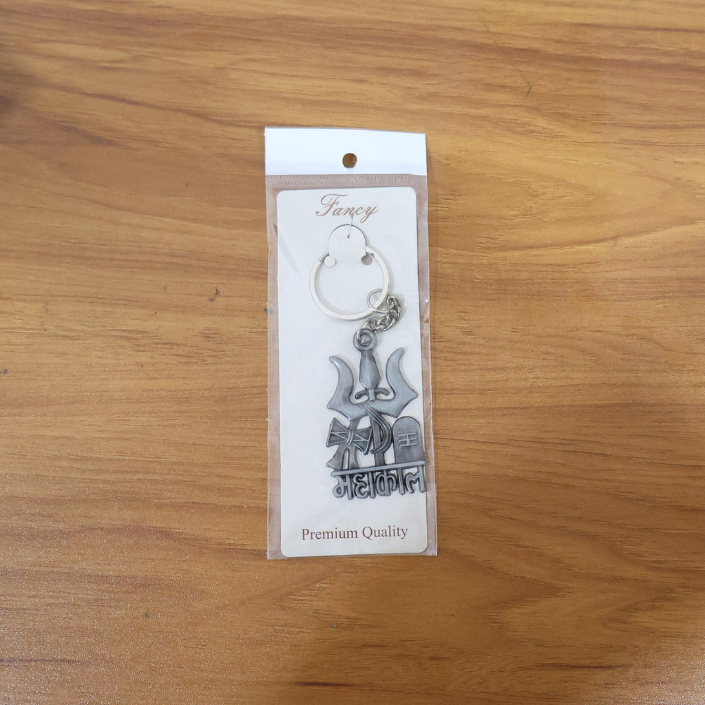 Lifestyle image showing Mahakal metal keychain as key accessory