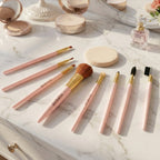 Close-up of soft bristles on various makeup brushes for face and eyes