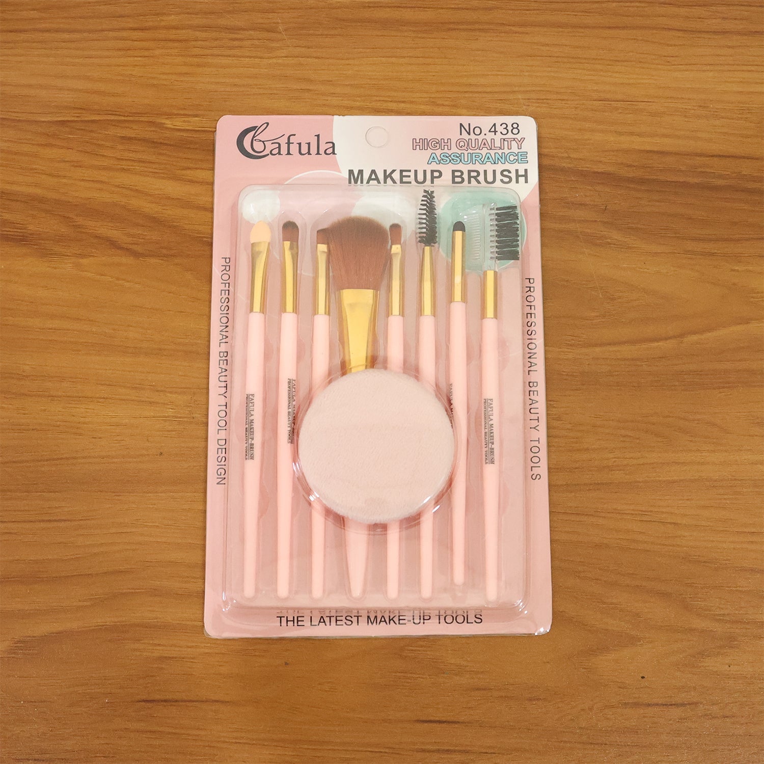 All 9 makeup brushes and puff laid out for easy access during makeup