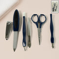 Manicure pedicure grooming kit tools laid out for nail care