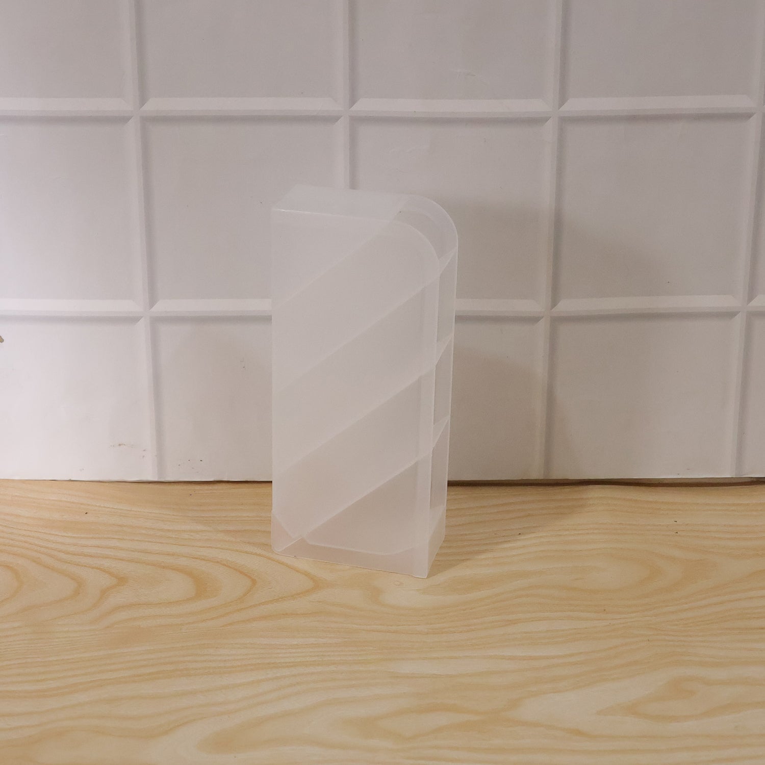 In-use plastic desk organizer with multiple compartments