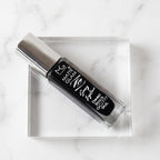 Precision applicator brush of deep black matte eyeliner for fine or bold strokes