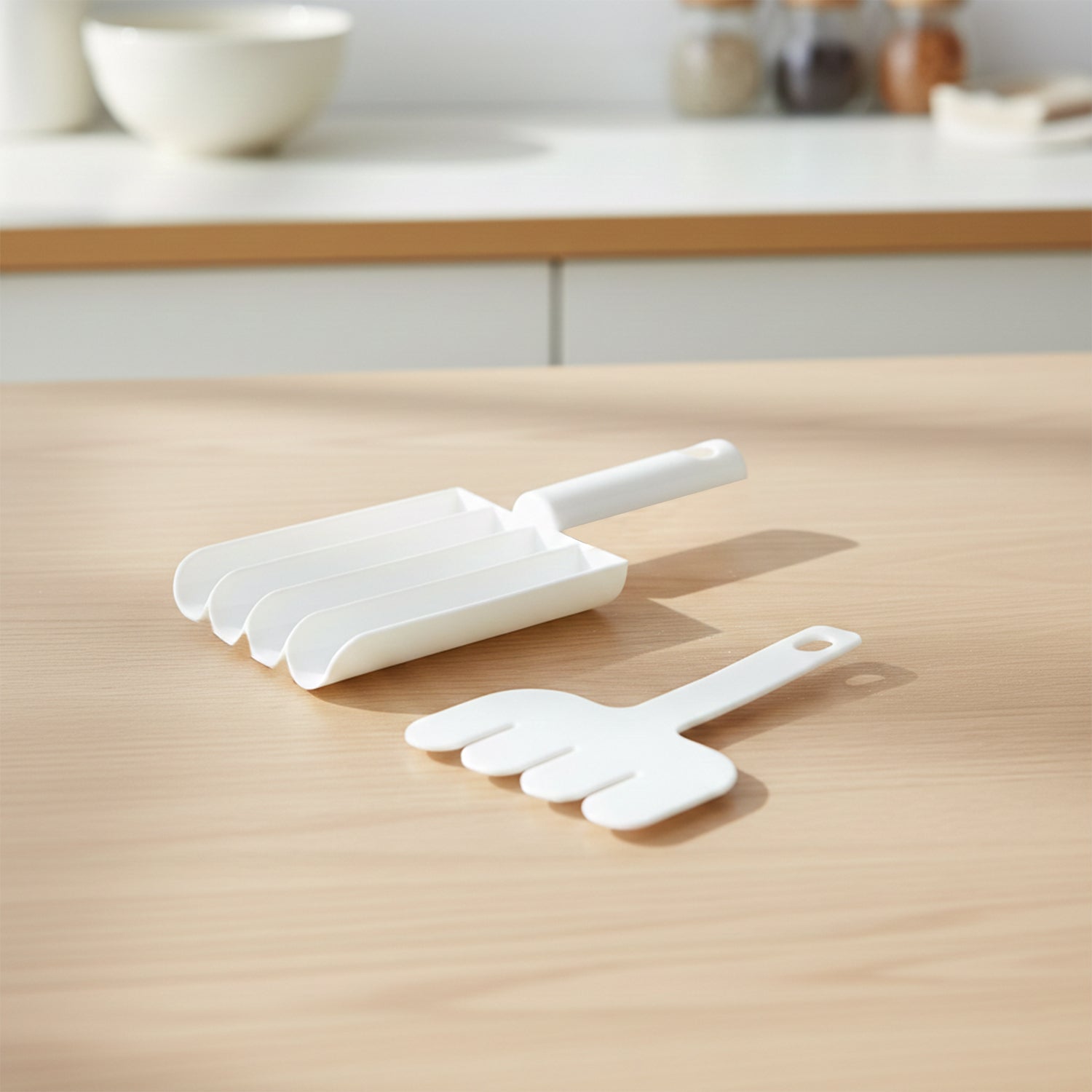 Close-up of manual food slicing and frying press tool for kitchen