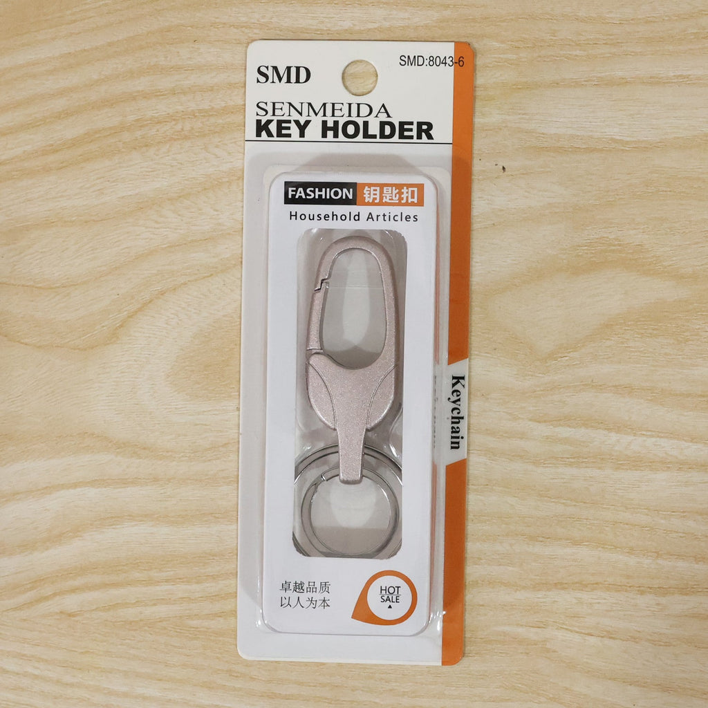 Metal keychain displayed with size reference