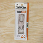 Metal keychain displayed with size reference