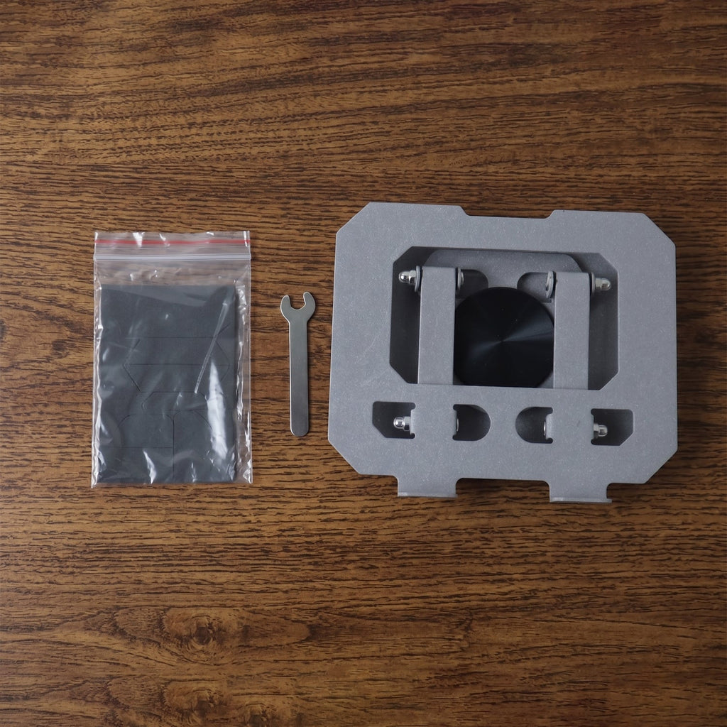 Smartphone on foldable metal stand on desk