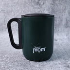 Close-up of stainless steel insulated mug lid and handle