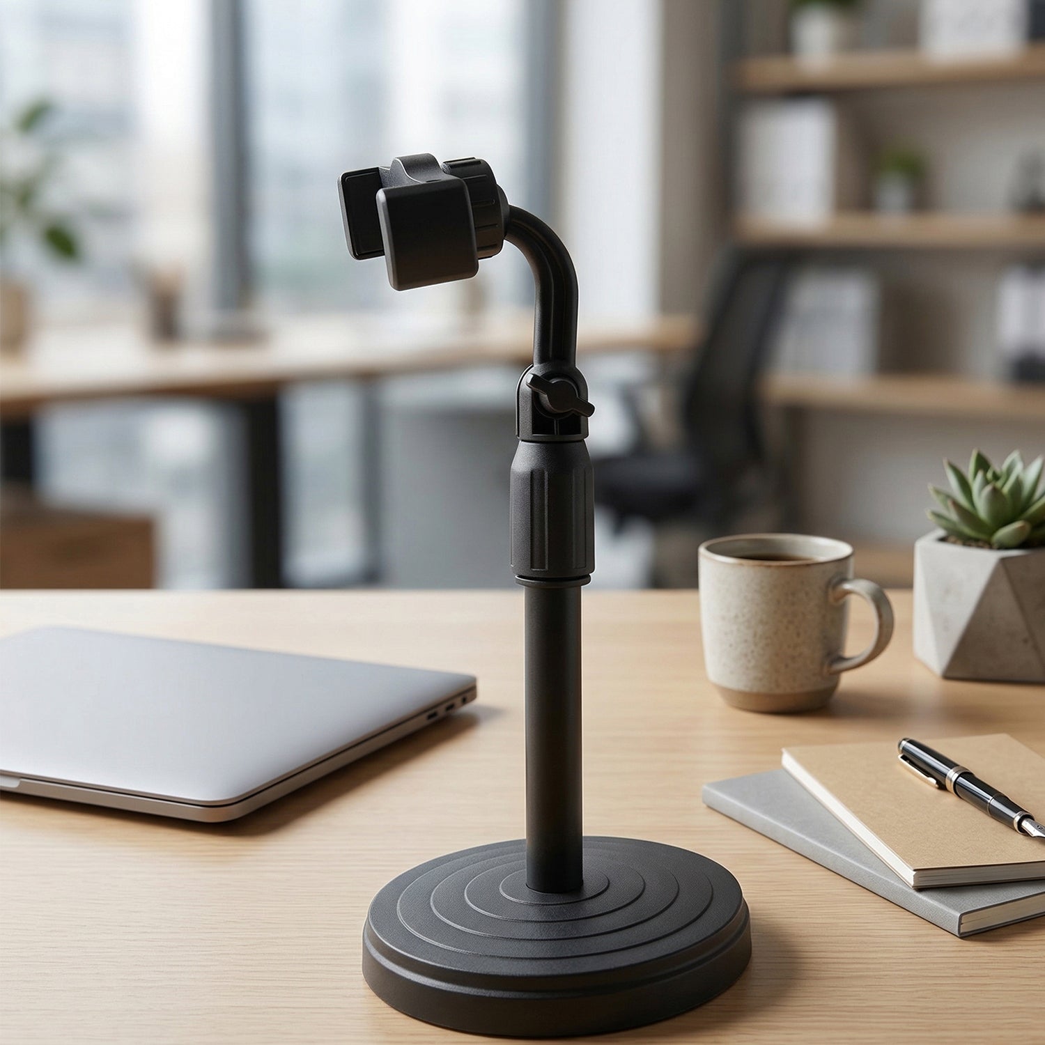 Rotating smartphone stand on desk for hands-free use