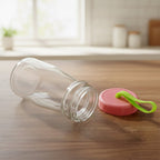 Transparent premium glass bottle body without lid showing clarity