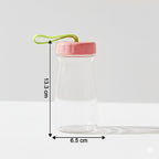 Close-up view of glass bottle topped with leak-proof silicone lid