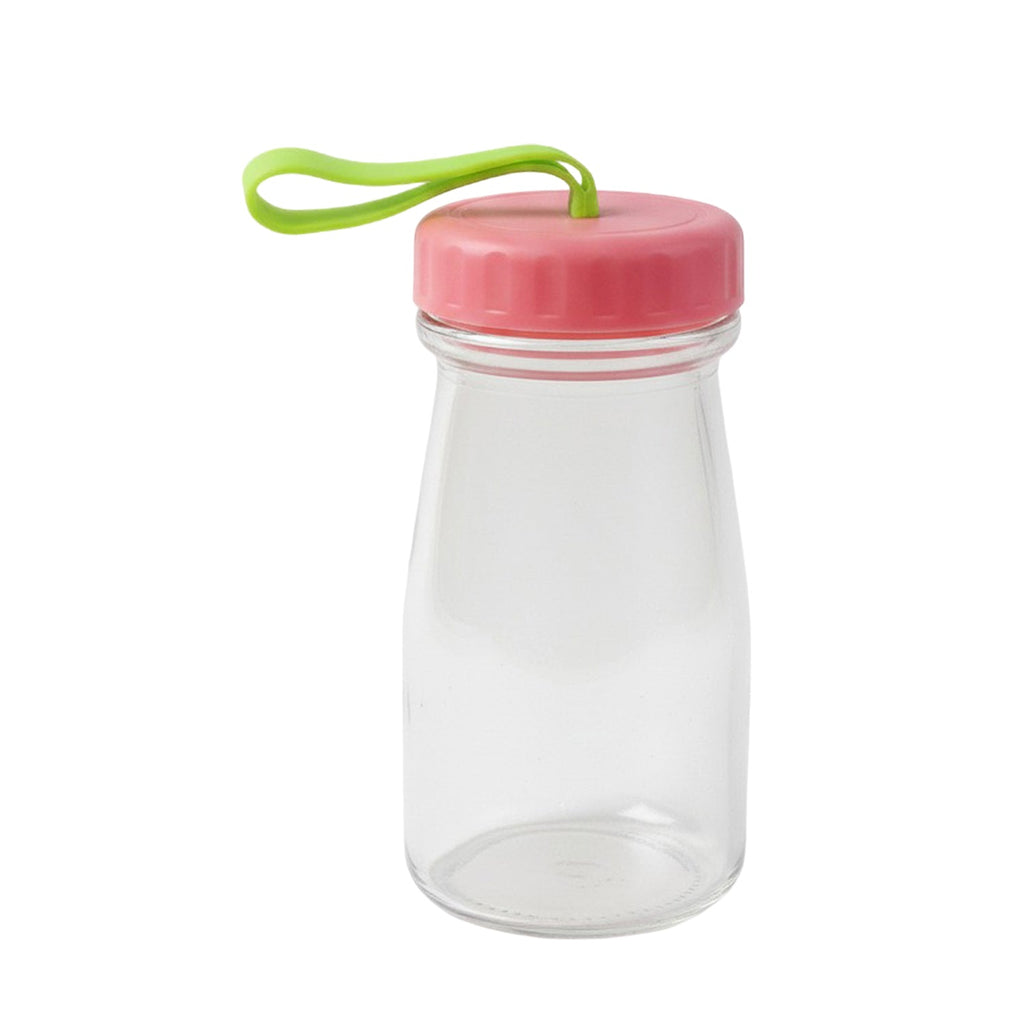 Glass container with brightly colored silicone cap and ergonomic handle