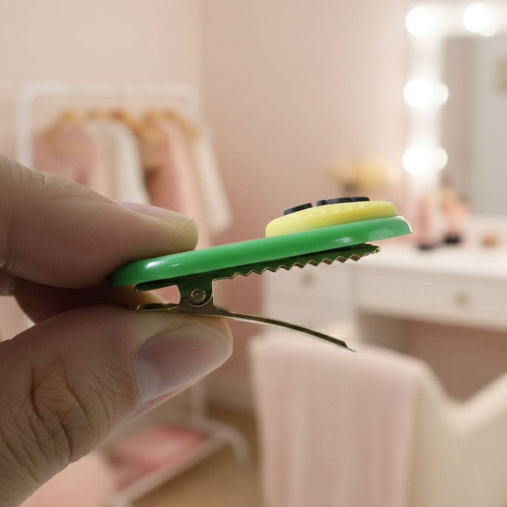 Four decorative hair clips neatly arranged with text accent styling
