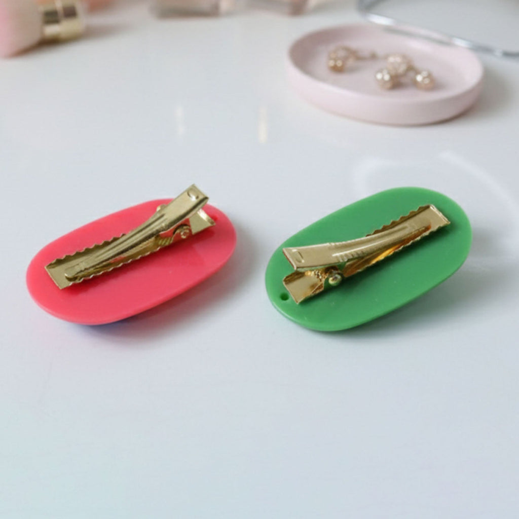 Woman styling her hair using a decorative hair clip for casual look