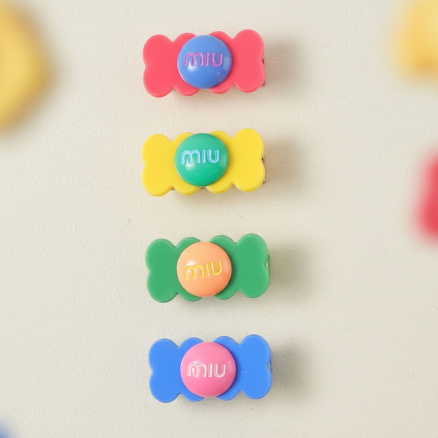 Candy hair clips arranged to highlight their fun and colorful candy-inspired design