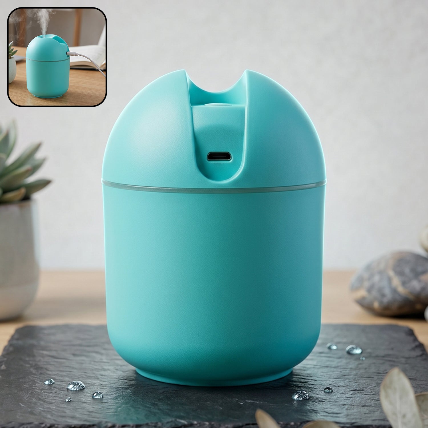 Portable USB mini air humidifier releasing cool mist for home or travel