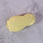 Front view of utility knife with retractable blade and ergonomic handle