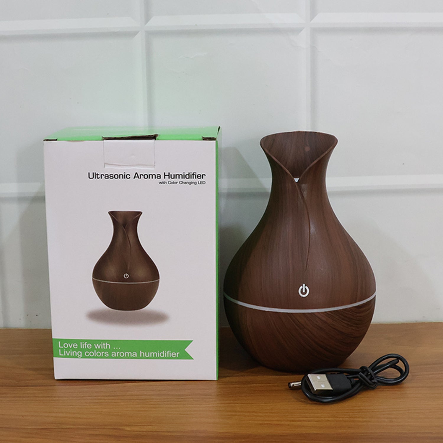 The Mini Wooden Humidifier enhancing a workspace with its quiet operation.