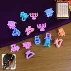 Set of 3 colourful mini hair clips for girls displayed on a white background.