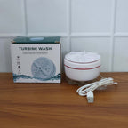 The mini washing machine actively cleaning clothes in a real-life home setting.