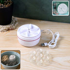 A compact white mini washing machine with a visible turbine, ready for use.
