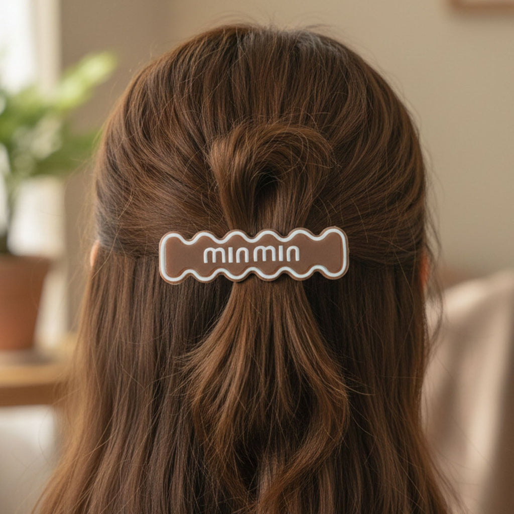 Close-up of hair clip set featuring wavy design detail
